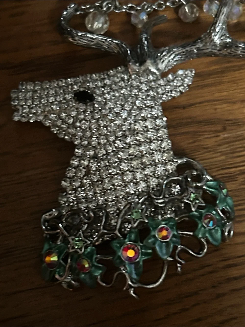 Kirks Folly Silver-tone Crystal Stag Brooch with Green Enamel Flowers